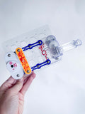 Snap Circuit (specifically made for 3-6 year olds- no batteries!).  Early childhood education for engineering inspiration.