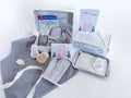 All components of the Frosty Fun Baking Kit laid out, including baking tools, recipe book, and activities